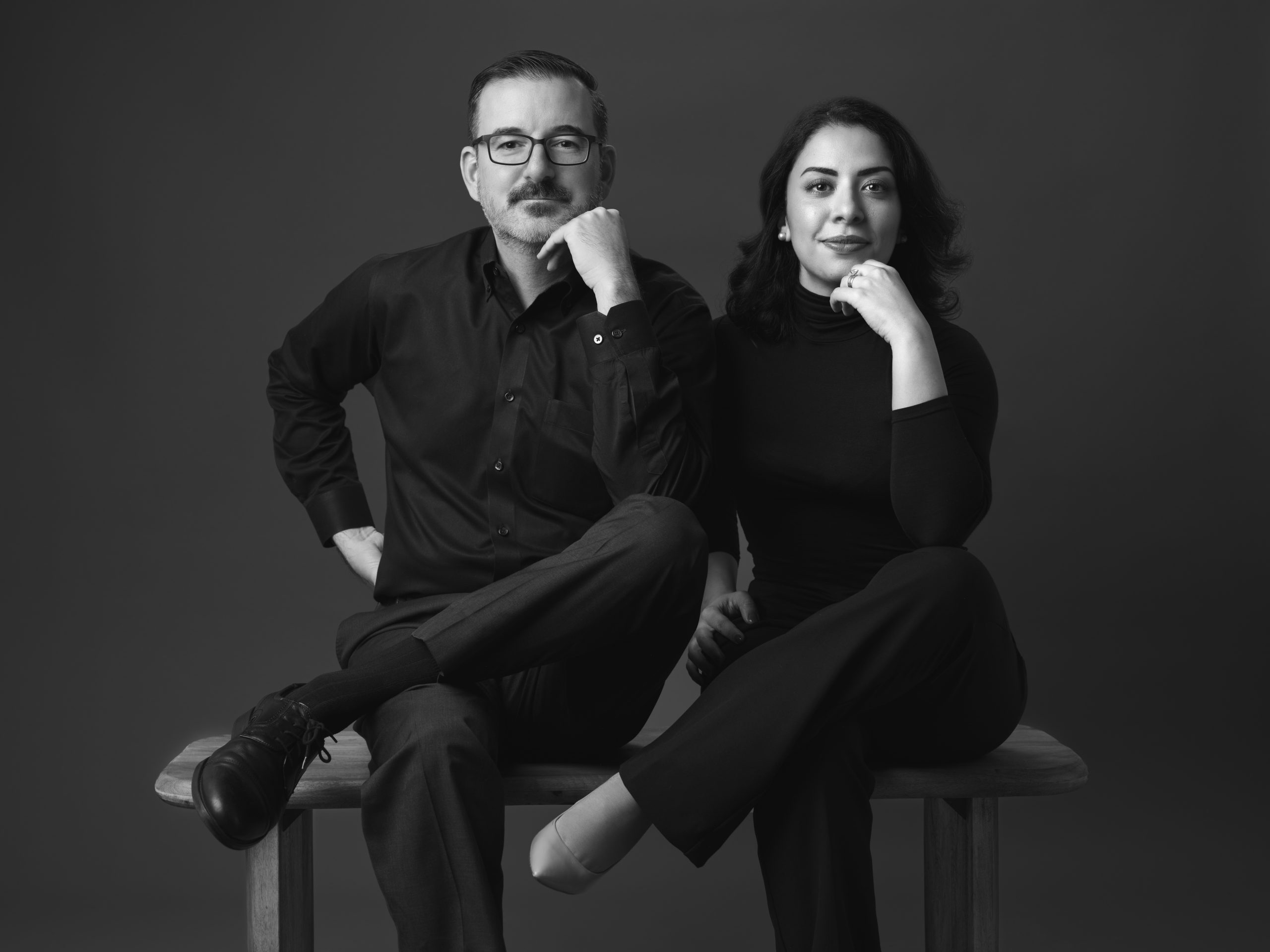 Andrew McCaul & Nadia Mounsif sitting on a bench